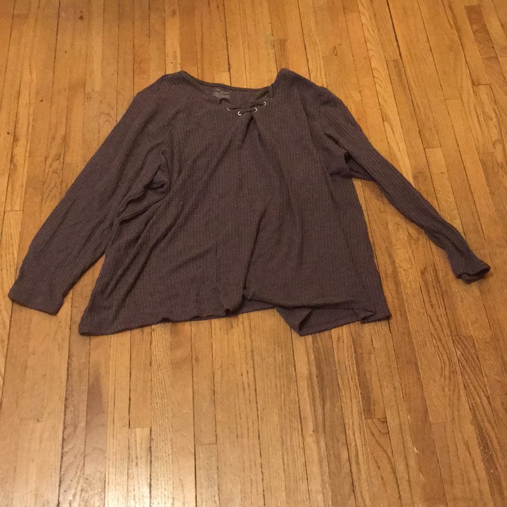 Purple long sleeve top.